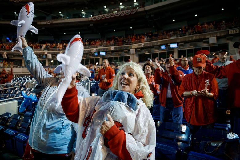 Nats fans celebrate win — without climbing the light poles