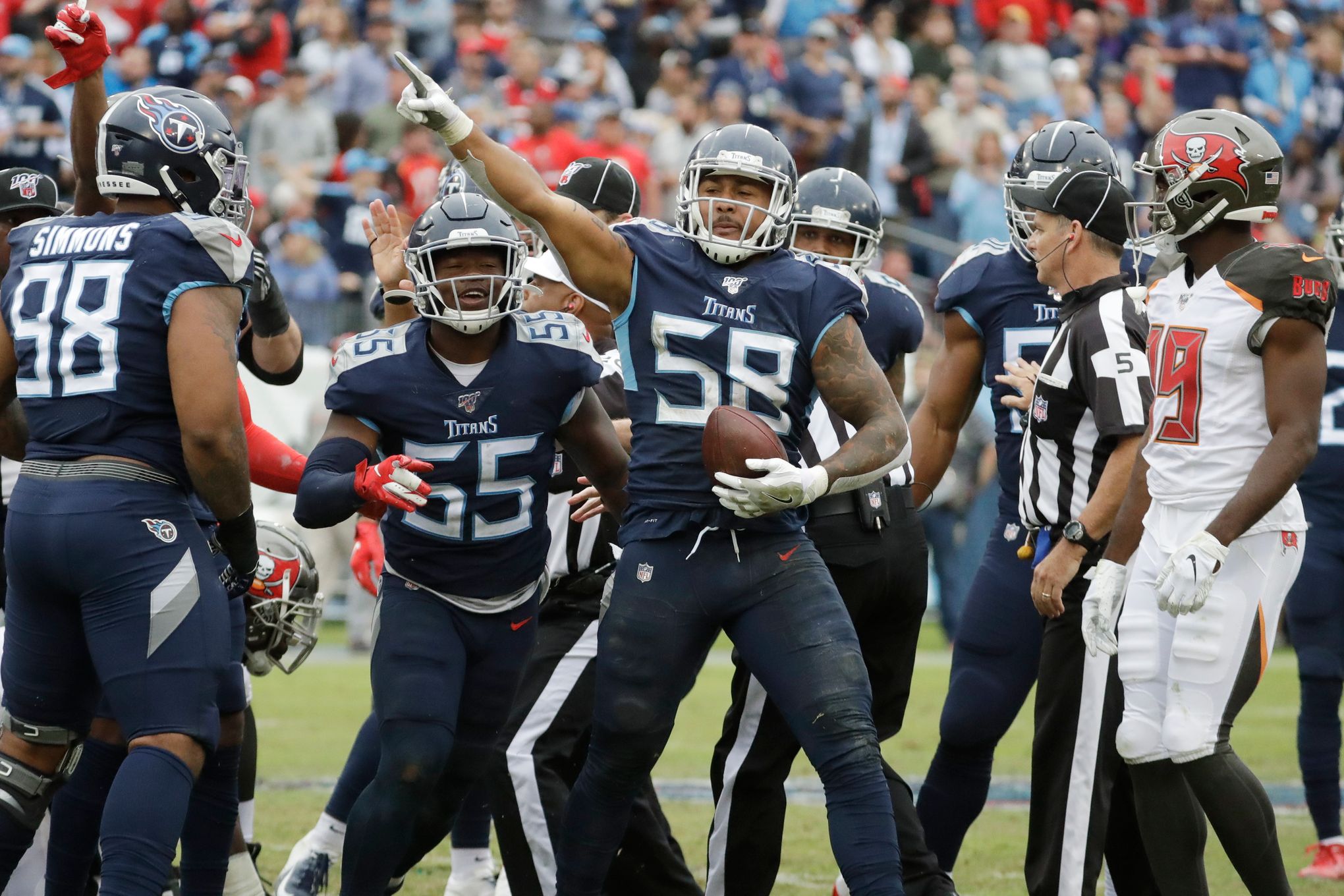 Titans force four turnovers in 27-23 win