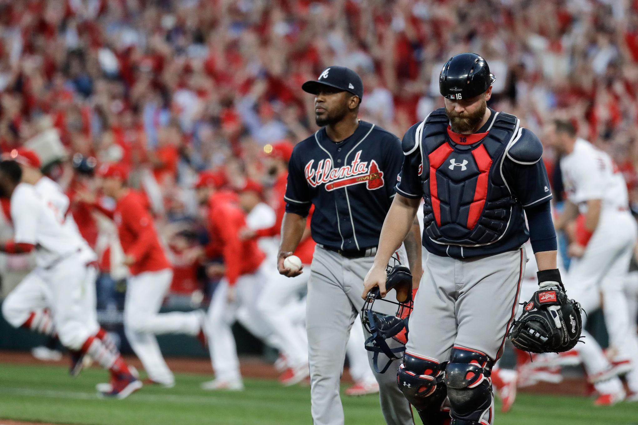 Braves catcher Brian McCann enjoys family time with his 1-year old