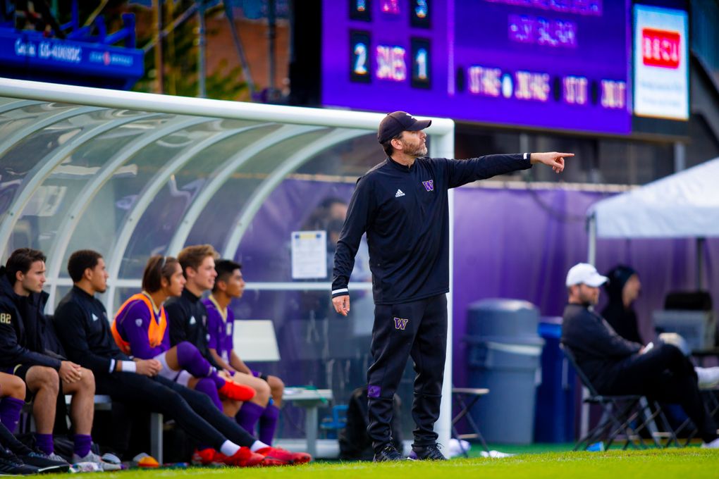 UW men’s soccer coach Jamie Clark calls out to his players as his team defeats Oregon State 2-1 on Oct. 13, 2019. (Scott Eklund /Red Box Pictures)