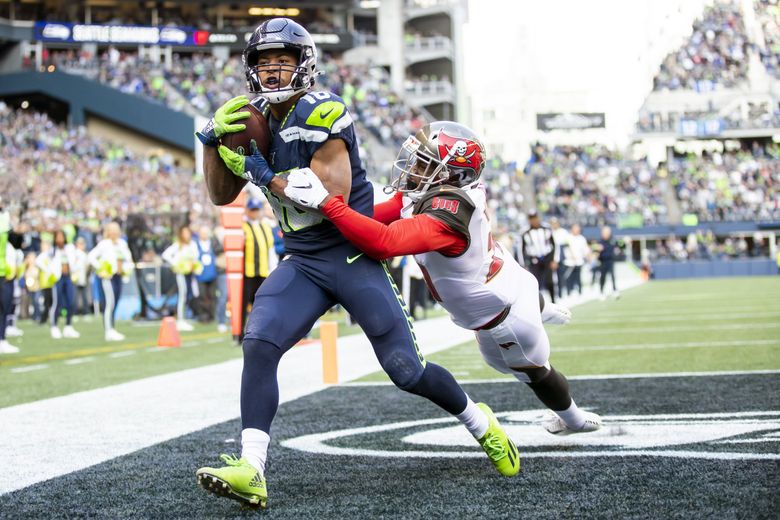 November 3, 2019: Seattle Seahawks wide receiver Tyler Lockett (16) catches  Seattle's first touchdown reception from Russell Wilson in the first  quarter of the NFL game between the Tampa Bay Buccaneers and