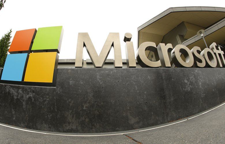 FILE – This July 3, 2014, file photo, shows the Microsoft Corp. logo outside the Microsoft Visitor Center in Redmond, Wash. Microsoft is cutting jobs announced Wednesday, May 25, 2016, as the company continues its attempts to salvage a rocky entrance into the smartphone market. (AP Photo Ted S. Warren, File) NY108