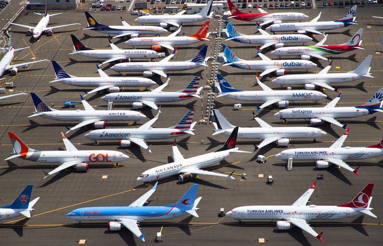 Aerial photograph shows a stockpile of Boeing 737 MAX airplanes parked while awaiting FAA approval for a technical fix before they can be delivered to customers. This parking area is along the west side of Boeing Field and just south of the South Park Bridge.
Photographed on June 19, 2019. 210631