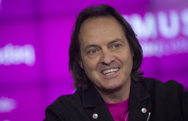 John Legere, chief executive officer of T-Mobile US Inc., speaks during a Bloomberg Television interview at the Nasdaq MarketSite in New York, U.S., on Tuesday, Oct. 27, 2015. Legere said he is pleased with T-Mobile’s overall results despite missing third quarter profit estimates. Photographer: John Taggart/Bloomberg *** Local Caption *** John Legere 588671081