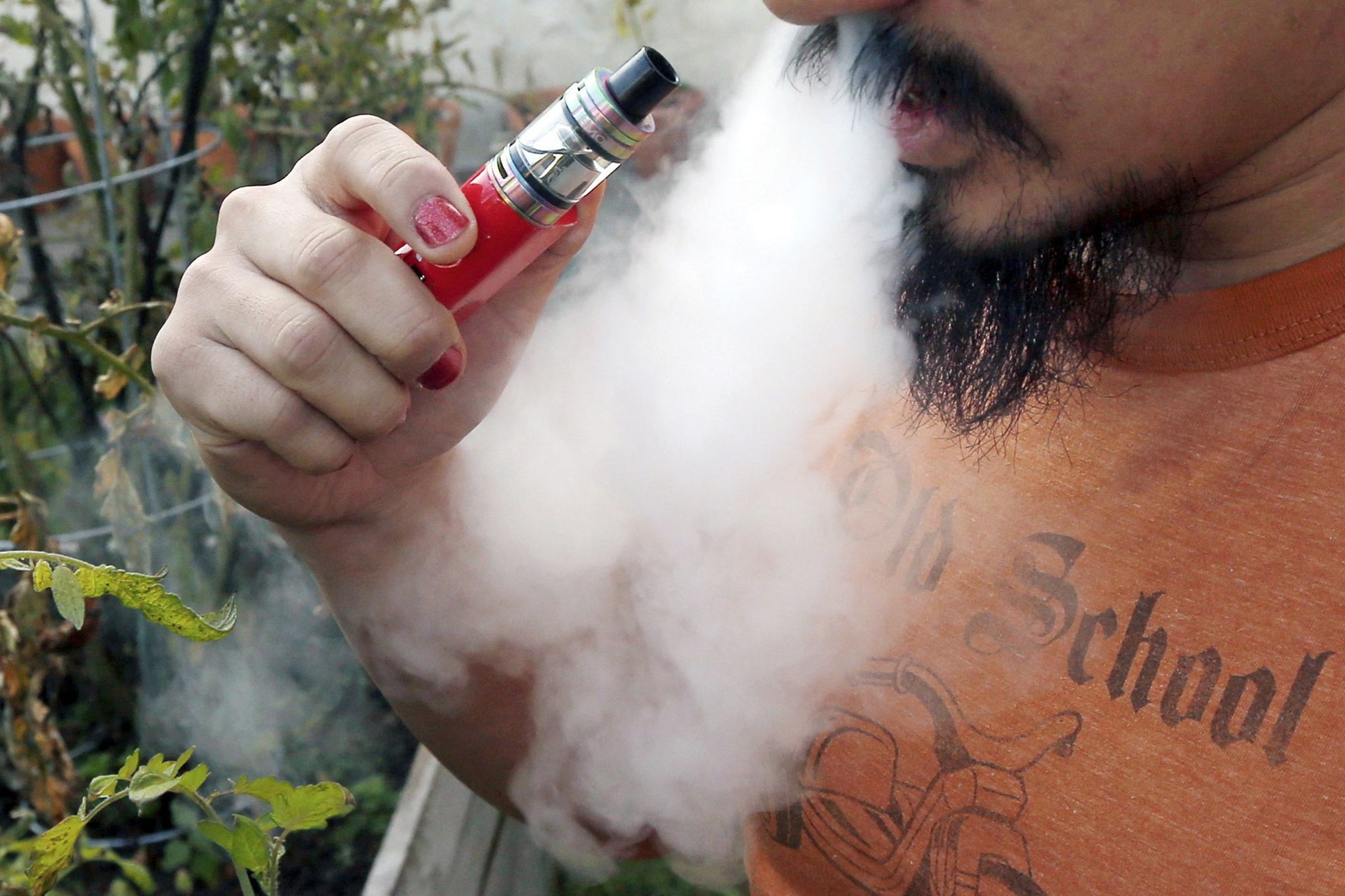 Trump pulls back from ban on e-cigarette flavors | The Seattle Times