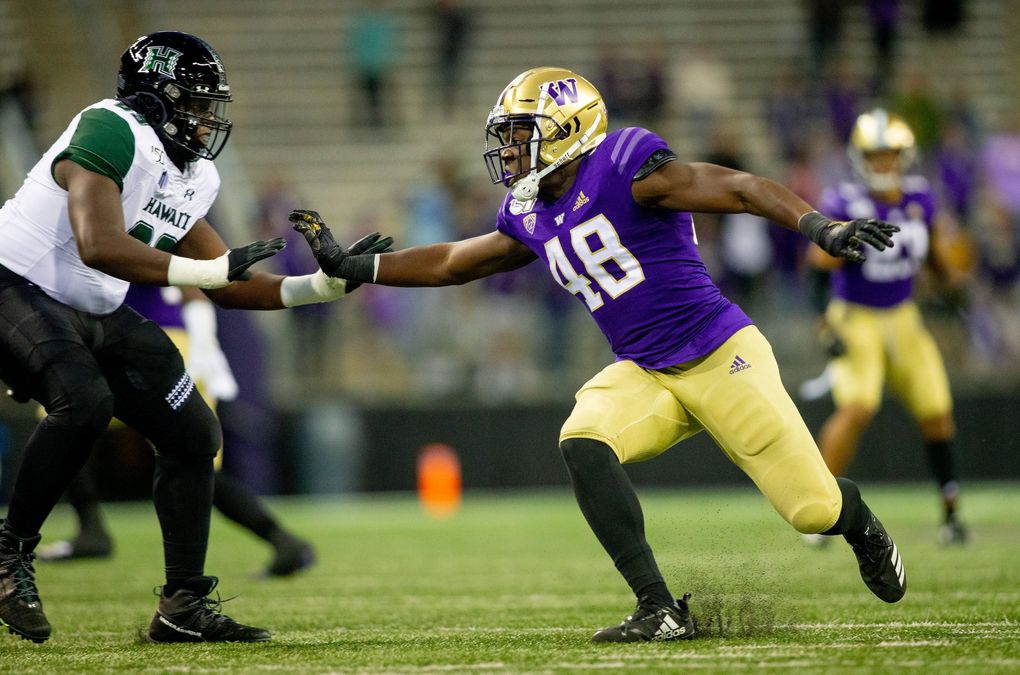 Edefuan Ulofoshio #48 of the Washington Huskies plays Hawaii on September 13, 2019. (Scott Eklund / Courtesy UW Athletics)