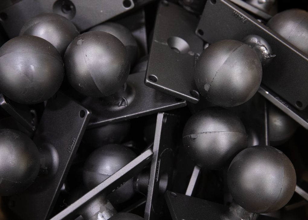 Completed plates with balls are designed at at RAM Mounts in Seattle. (Ellen M. Banner / The Seattle Times)
