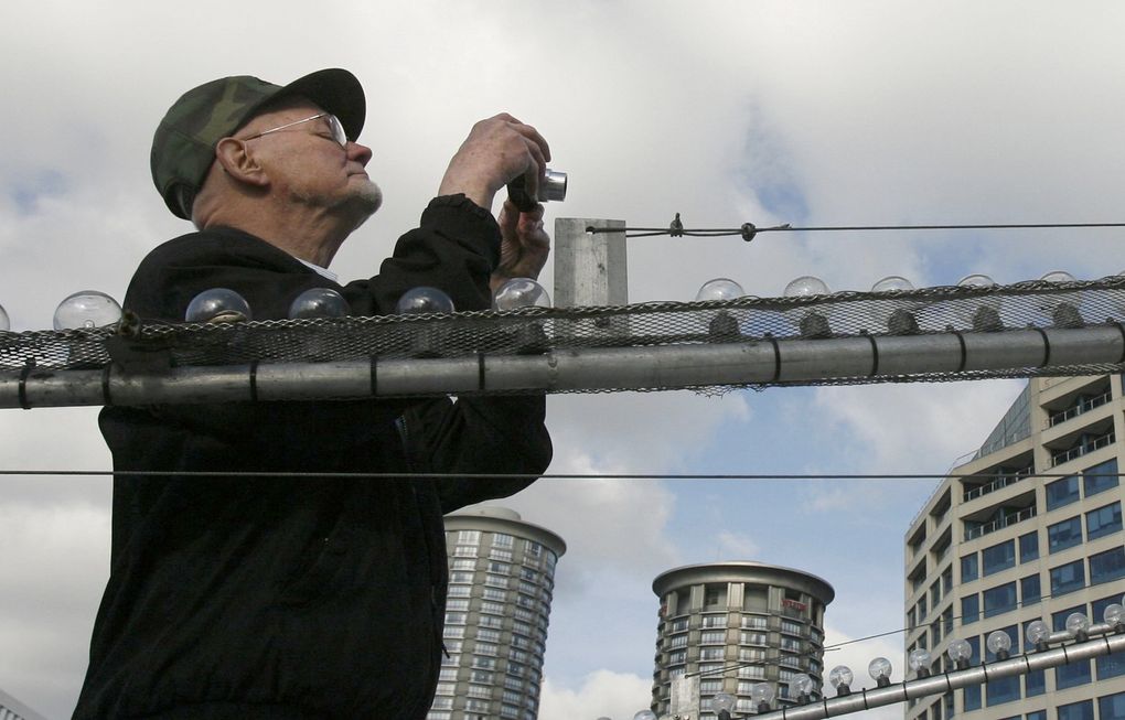Bob James, who designed the star in 1957 for the Bon Marché, returned to the roof in 2007 to photograph the piece as it came together. He died in 2011. (Alan Berner / The Seattle Times)