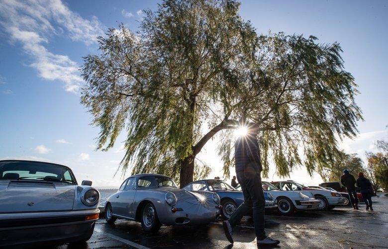 Car fans braved through the cold weather during the weekly Lake Washington Cars and Coffee meetup in Madrona Park on Nov. 24, 2019. “There’s always a cohort of classic Porsches, a few regular Japanese tuner cars or a lot of older Alpha Romeos. It’s nice because its eclectic, not just all crazy high end” says attendee Robert Howard. “They’re in all states of repair”.  212223