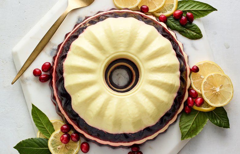 Cherry-Lemon Cream Jell-O Mold, a modern holiday mold that is a bit less sweet and has more natural fruit juice than the classics, but is still extravagantly festive, in New York on Nov. 23,  2019. Food Stylist: Barrett Washburne. (Audra Melton/The New York Times) XNYT114 XNYT114