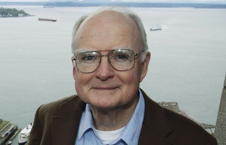 William Ruckelshaus, the first administrator of the EPA, poses Monday, April 13, 2009, at his office in Seattle, Wash., overlooking west Seattle, and Puget Sound’s Elliott Bay. Ruckelshaus told the Associated Press that there is “a lot pent up demand” for action on climate after the little done about global warming by President George W. Bush in his two terms. (AP Photo/Ted S. Warren)