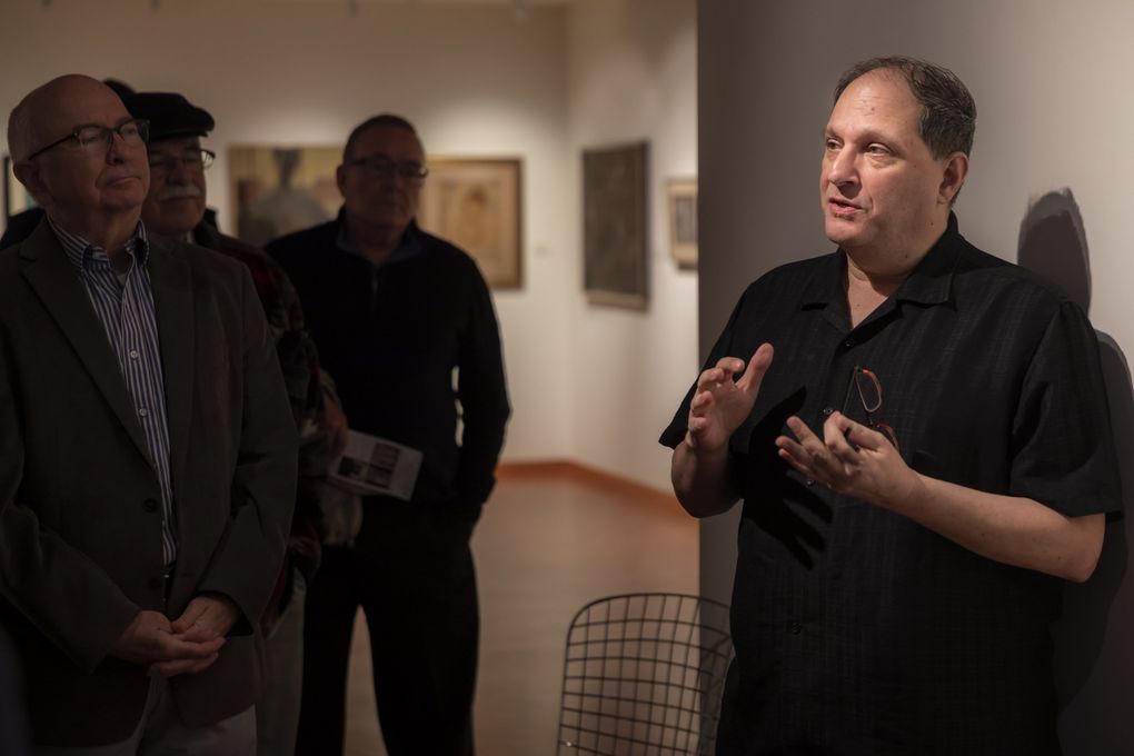“Haven’t we all had to be activists at some point in our lives,” curator David Martin says as he gives a tour of Cascadia Art Museum’s exhibition, “The Lavender Palette,” which features gay and lesbian artists from around the Pacific Northwest. (Bettina Hansen / The Seattle Times)
