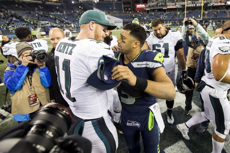 While Eagles suffer Super Bowl hangover, Russell Wilson has kept