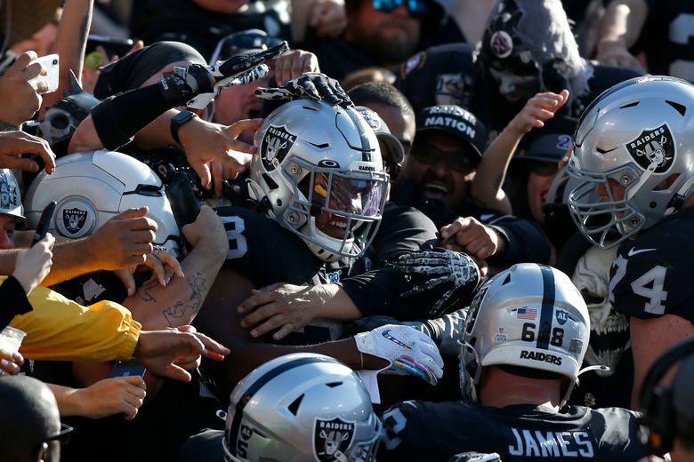 Raiders get late TD pass, defensive stop to beat Lions 31-24