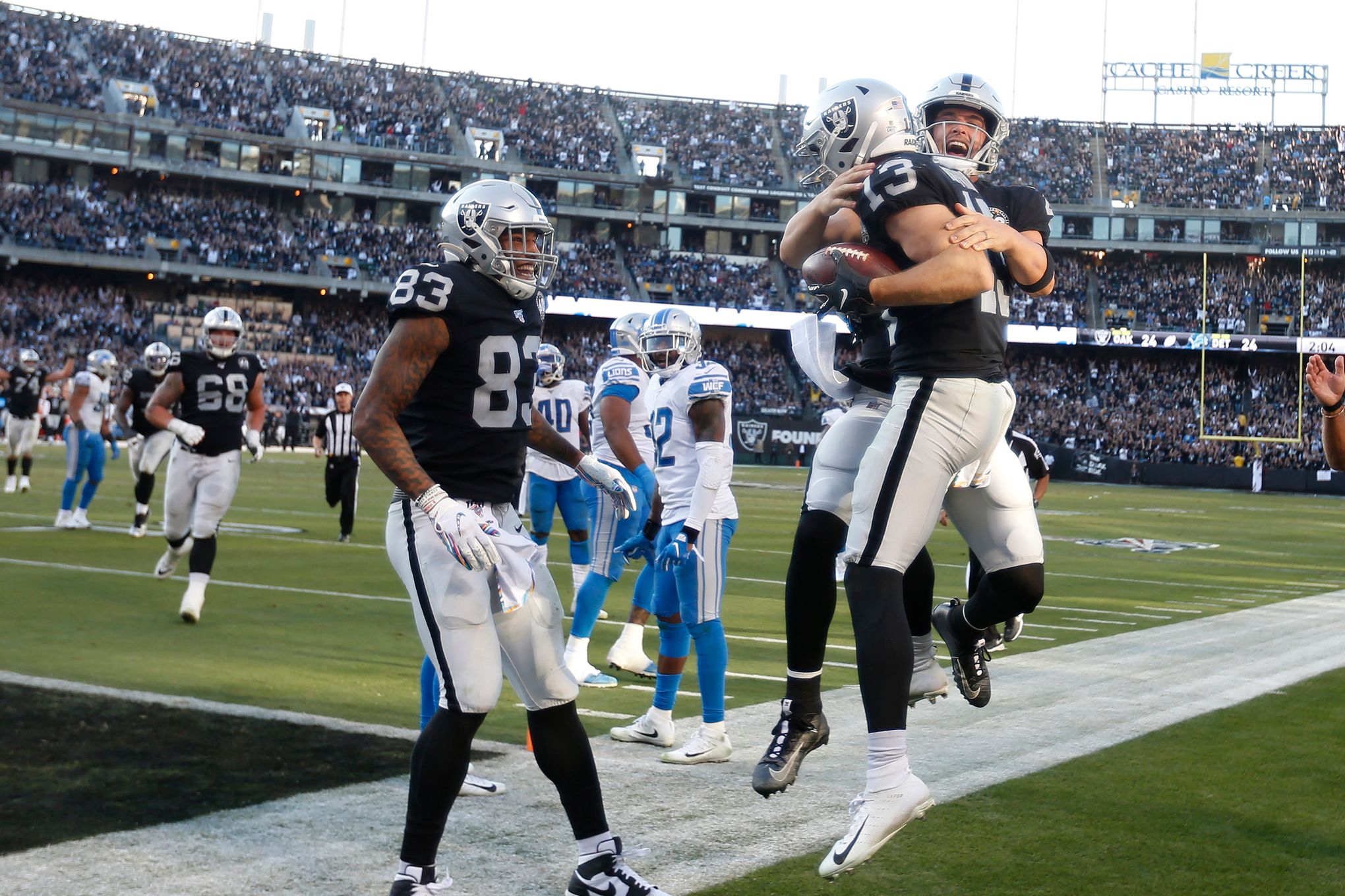 Oakland Raiders wide receiver Hunter Renfrow (13) holds on to the football  after a catch during …