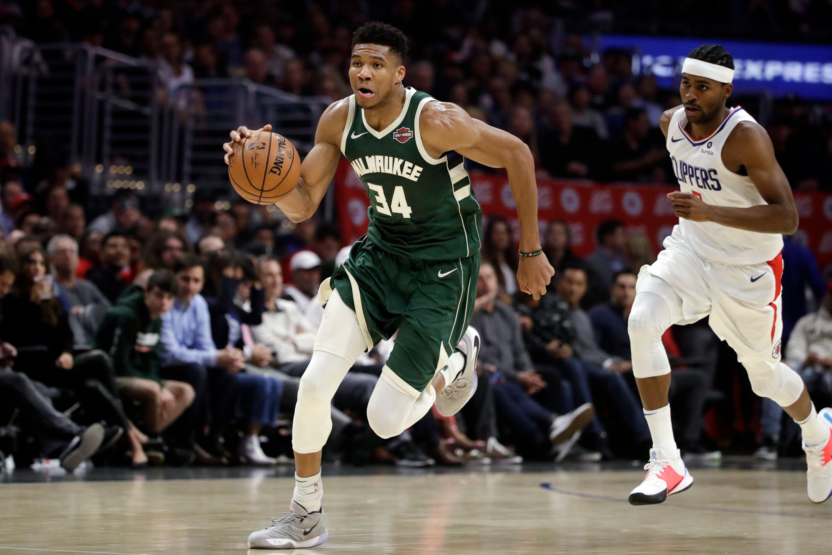 Bucks hold off Clippers 129 124 for 4th win in a row The Seattle