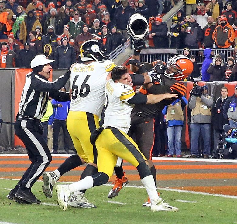 Watch: Browns' Garrett swings helmet at head of Steelers QB