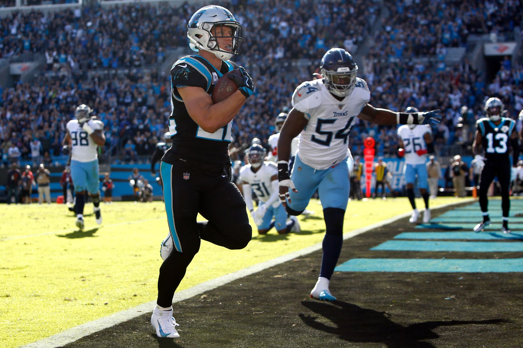 Christian McCaffrey Carolina Panthers Autographed 16 x 20 Stiff Arm  Photograph