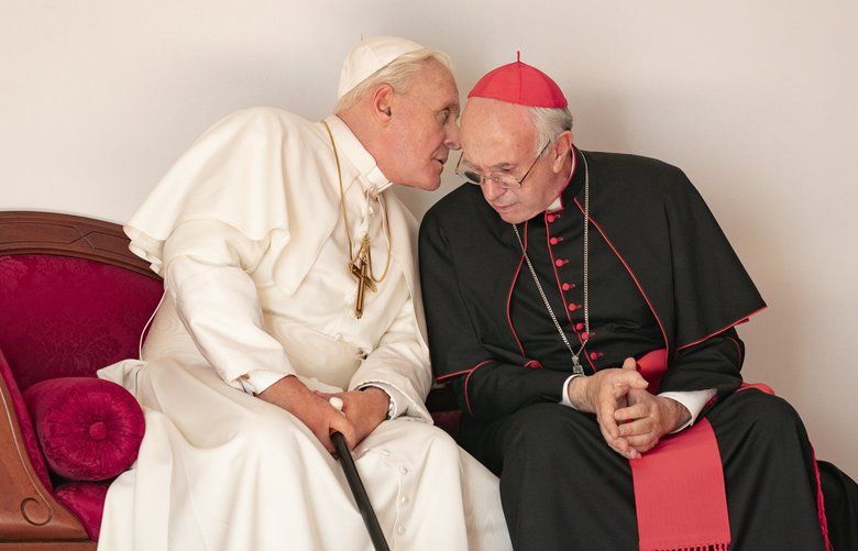 Anthony Hopkins, left, and Jonathan Pryce in “The Two Popes.”