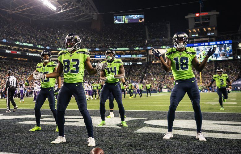 After David Moore’s 60-yard touchdown reception, Seattle Seahawks receivers dance in the end zone during a game against the Minnesota Vikings on Monday, Dec. 2, 2019 at CenturyLink Field in Seattle. (Dean Rutz / The Seattle Times)