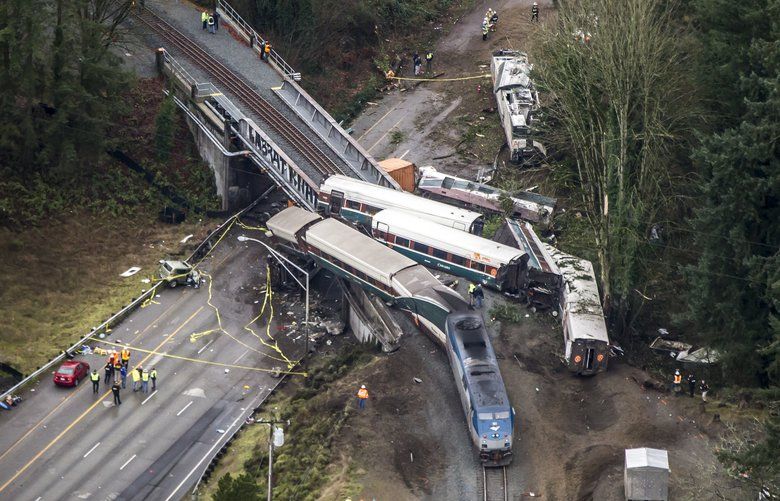 An Amtrak train derailed and fell off of a bridge and onto Interstate 5 near Mounts Road between Lakewood and Olympia Washington Monday December 18, 2017. 204596