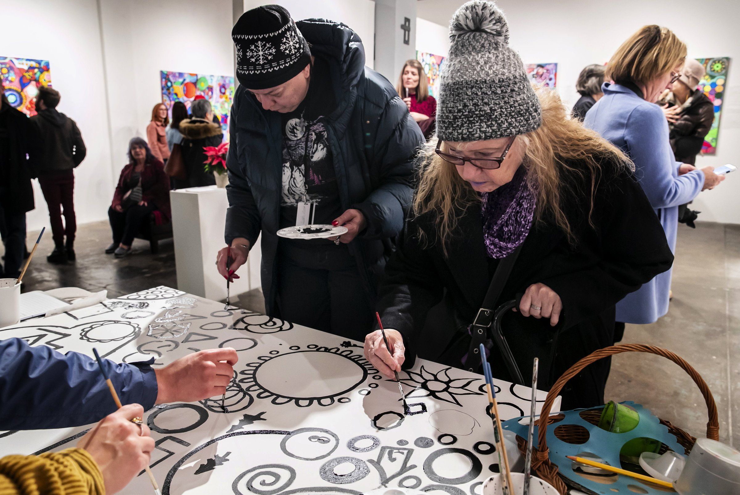 A Bothell artist goes to homeless shelters with empty canvases