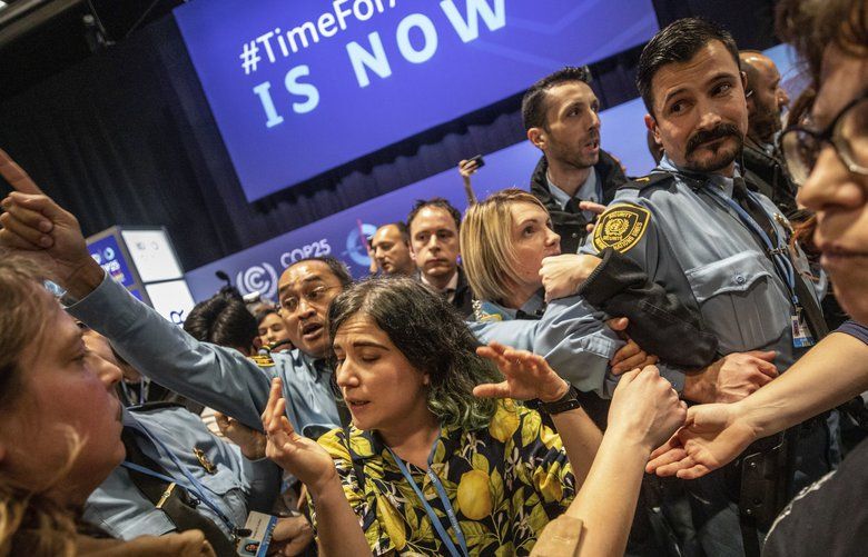 Protesters vent their anger as UN climate talks stutter | The Seattle Times