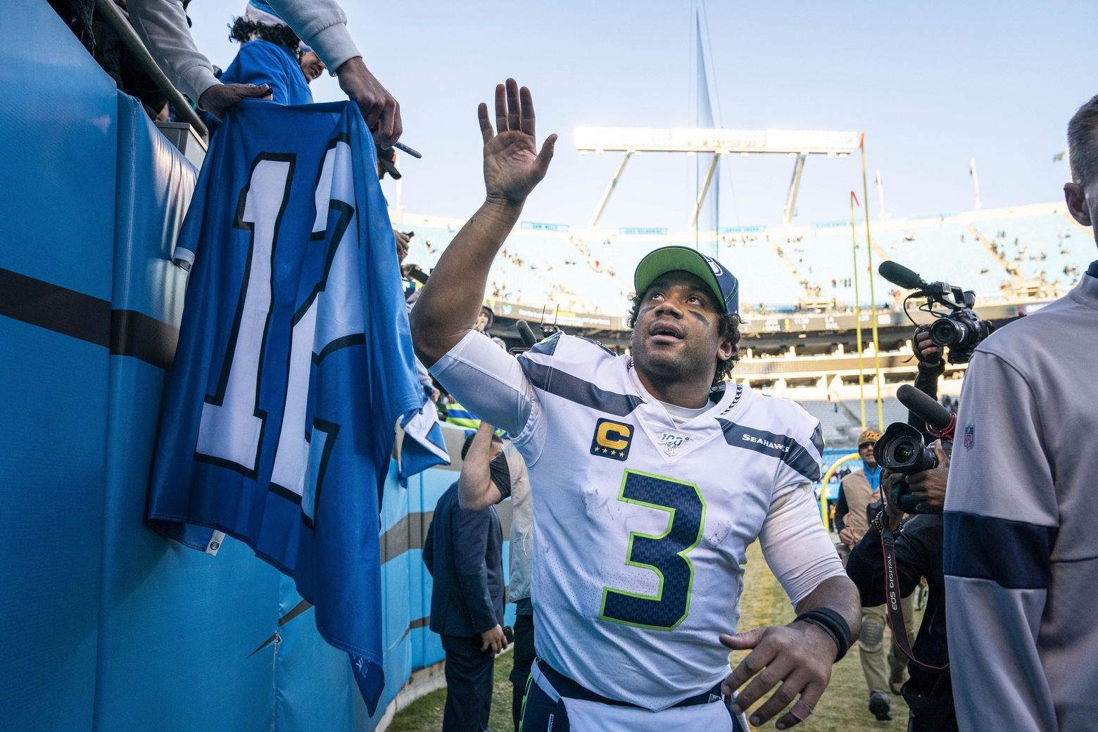 It wasn't easy, but the Seahawks win, clinch playoff berth and reclaim  their first-place spot in NFC West