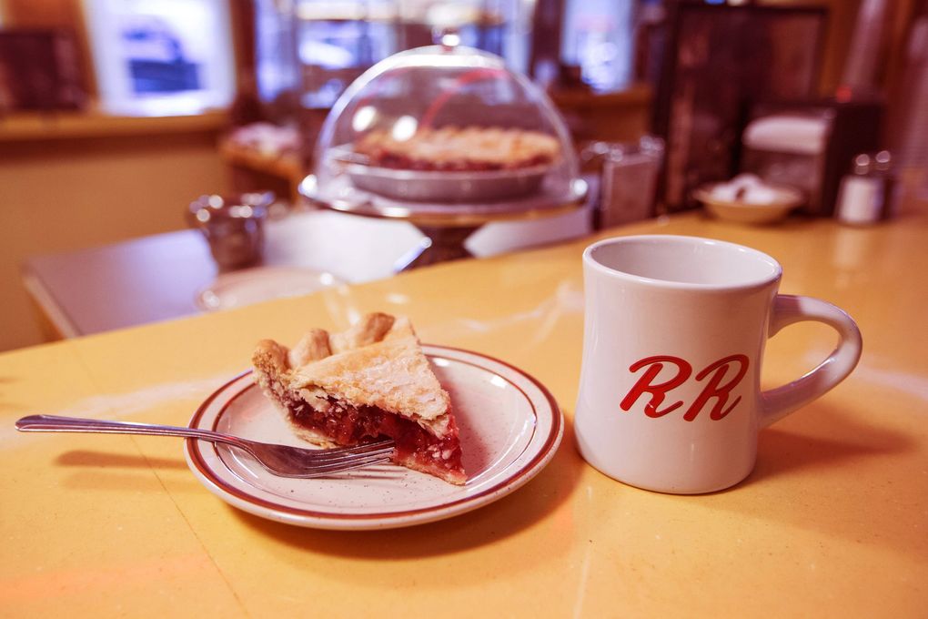A slice of cherry pie and a cup of coffee are a common trope on Lynch’s series. The text on the coffee cup is a reference to the Double R Diner, in reality North Bend’s Mar-T — then Twede’s — Cafe. (Patrick Wymore / Courtesy of Showtime)