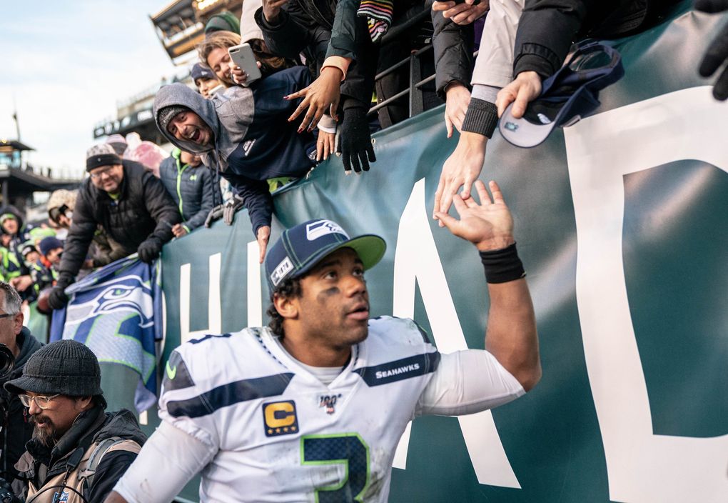 Seahawks quarterback Russell Wilson has provided a steady, consistent — and often spectacular — hand at the game’s most vital position. (Dean Rutz / The Seattle Times)