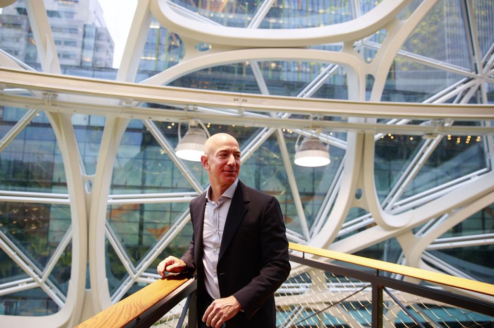 Jeff Bezos tours The Spheres at Amazon’s campus in Seattle. Amazon’s monumental growth arguably changed Seattle more than anything else in the past decade. (Erika Schultz / The Seattle Times, 2018)