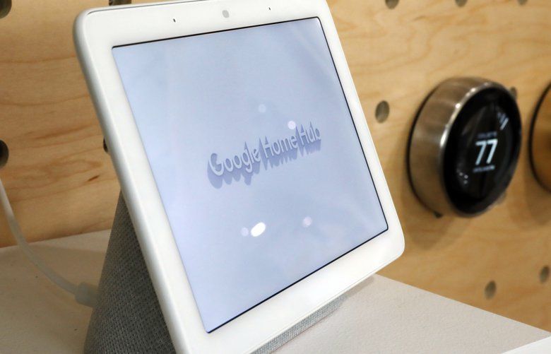 FILE – This Oct. 9, 2018 file photo shows a Google Home Hub displayed in New York. Many of these internet-connected speaker devices listen constantly for commands and connect to corporate servers to carry them out. Typically, they will ignore private chatter and transmit sound recordings only when you trigger the device, such as by pressing a button or speaking a command phrase like “OK Google.â€ Some gadgets also have a mute button to disable the microphones completely. But there’s no easy way for consumers to verify those safeguards. (AP Photo/Richard Drew, File) NYBZ204 NYBZ204