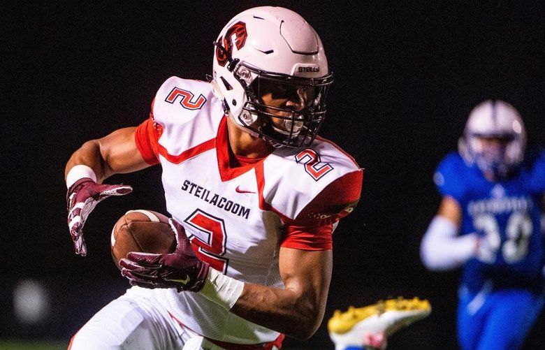 Steilacoom’s Emeka Egbuka (2) runs after a catch in the first quarter. Eatonville played Steilacoom at Eatonville High School in Eatonville, Wash., on Friday, Oct. 12, 2018.