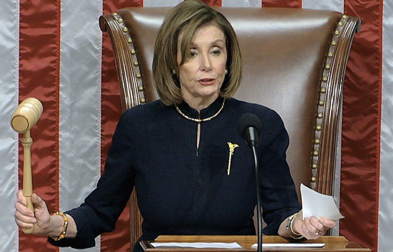 House Speaker Nancy Pelosi of Calif., announces the passage of the second article of impeachment, obstruction of Congress, against President Donald Trump by the House of Representatives at the Capitol in Washington, Wednesday, Dec. 18, 2019. (House Television via AP) DCJE318 DCJE318