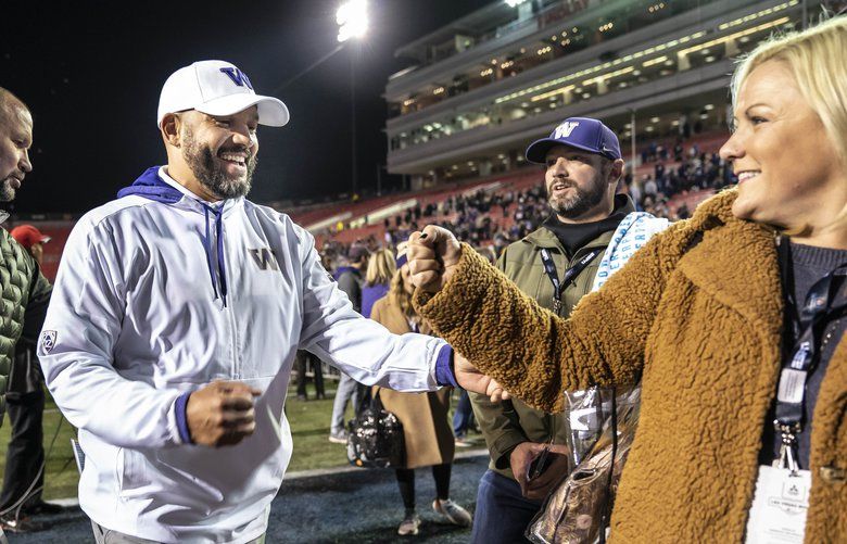 Jimmy Lake meets with Washington Athletic Director Jennifer Cohen after the Huskies defeated Boise State in the Las Vegas Bowl. No. 19 Boise State played Washington in the Las Vegas Bowl December 21, 2019 in Las Vegas, NV. 212478