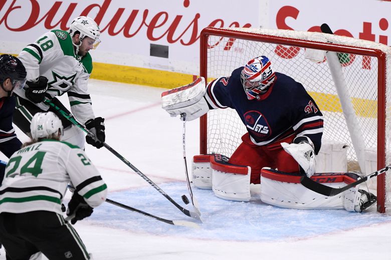 Connor's goal and 2 assists help Jets beat struggling Stars