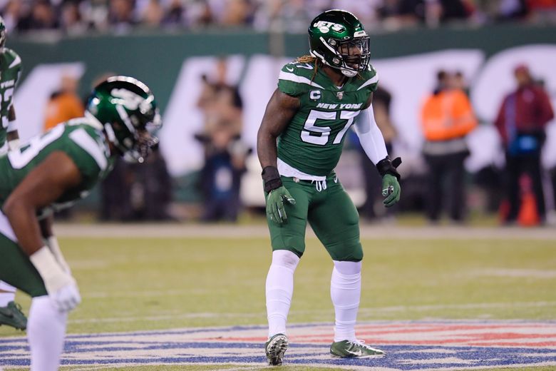 New York Jets linebacker C.J. Mosley (57) looks out before the