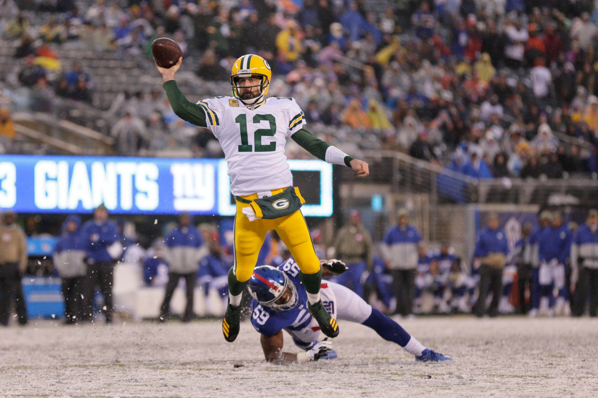 The MetLife Stadium field crew had a busy day shoveling snow at the Packers-Giants  game