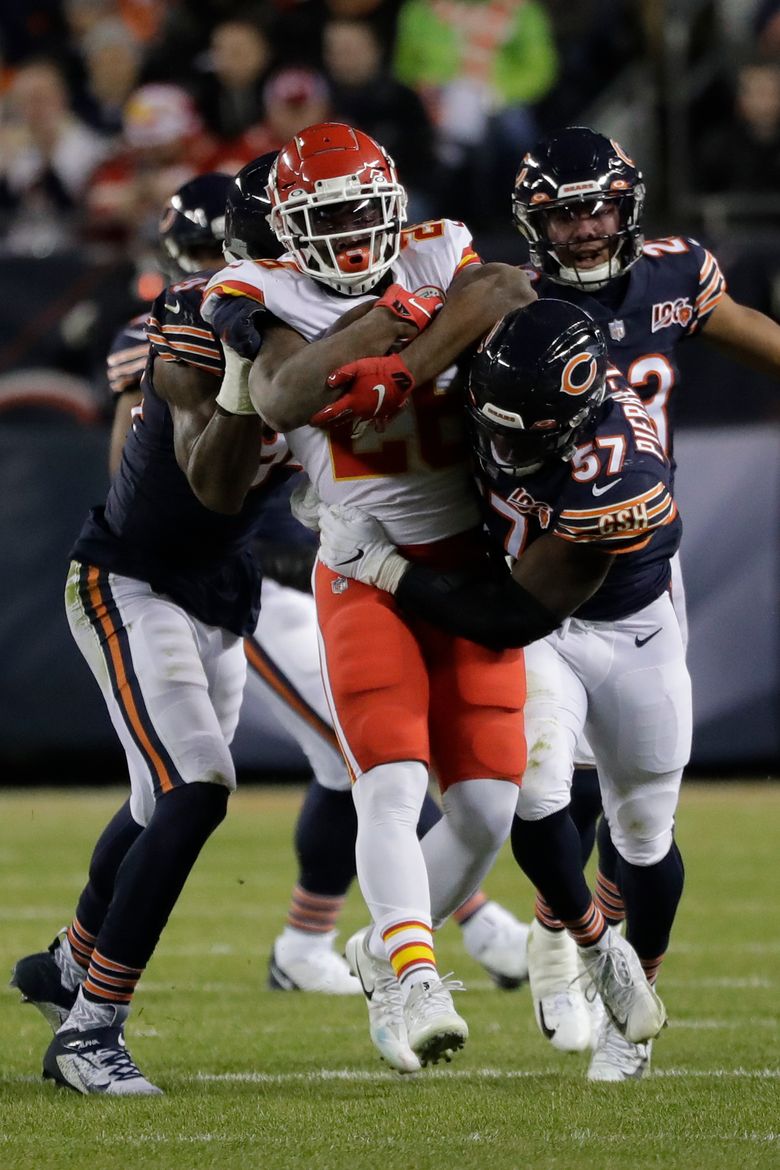 Kansas City Chiefs quarterback Patrick Mahomes (15) runs for a 12-yard  touchdown against the Chicago Bears in the first half of an NFL football  game in Chicago, Sunday, Dec. 22, 2019. (AP