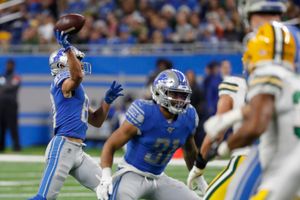 Packers barely beat Lions on late field goal to earn first-round bye