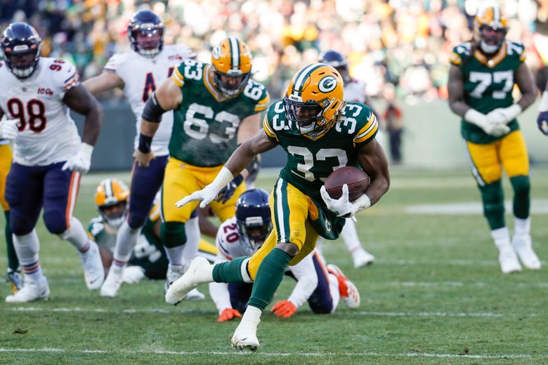 Packers playoff bound, beat Bears in rivals' 200th game