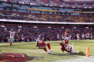 Washington Redskins free safety Montae Nicholson (left) chases New York  Giants running back Saquon Barkley (right) an NFL football game between the  New York Giants and the Washington Redskins, Sunday, Dec. 22