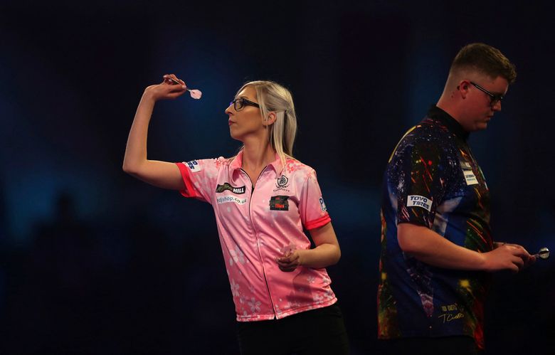 Female darts star beats a 2nd man at PDC World Championship