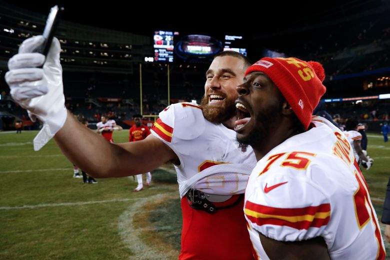 Kansas City Chiefs tight end Travis Kelce (87) looks on before an