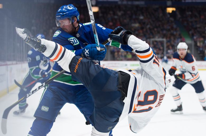 Quinn scores power-play goal as Canucks beat Oilers 4-2 | The Seattle Times