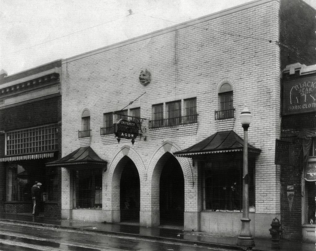 University Book Store moved from an on-campus location to 4326 University Way N.E. in 1925. The building featured a Gothic facade designed by architects Charles Bebb and Carl Gould. Note the carved Husky head up top. (Courtesy of University Book Store)