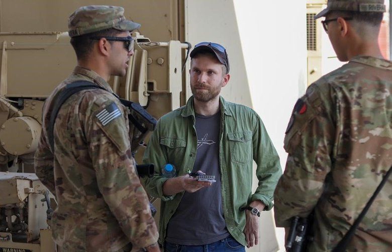 2 Washington state journalists, working alongside U.S. forces in Iraq ...