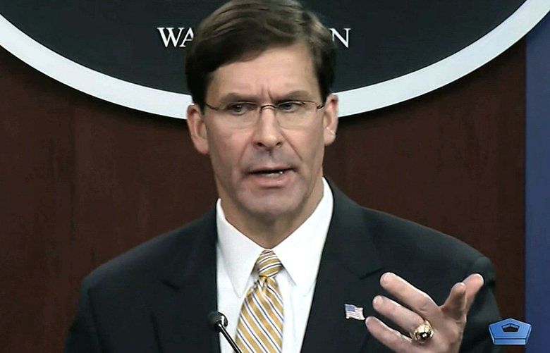 In this image from video, Secretary of Defense Mark Esper talks to the press on Iran and Iraq, Tuesday, Jan. 7, 2020, at the Pentagon in Washington. (divids via AP) WX203 WX203
