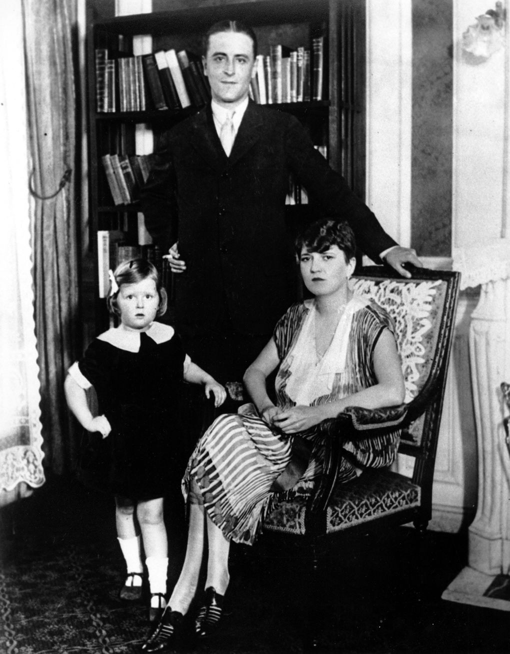 Author F. Scott Fitzgerald poses with his wife, Zelda, and his daughter Scottie in their apartment in Paris on July 16, 1925. (The Associated Press)