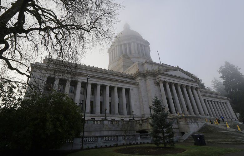 The Legislative Building is viewed through a light morning fog, Monday, Jan. 14, 2019, at the Capitol in Olympia, Wash., on opening day of the Washington Legislature. (AP Photo/Ted S. Warren) WATW101
